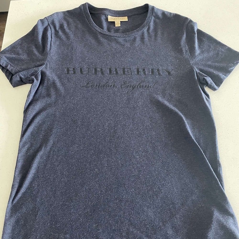 Perfect condition might of worn this one time. Very soft material. Unique navy